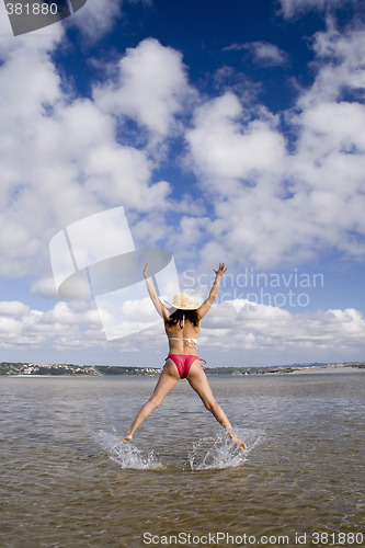 Image of Jumping with a hat (motion blur)