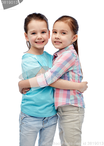 Image of happy smiling little girls hugging