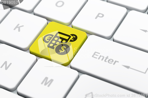 Image of Finance concept: Calculator on computer keyboard background