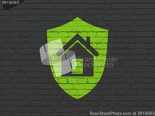Image of Business concept: Shield on wall background