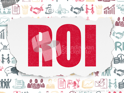 Image of Business concept: ROI on Torn Paper background