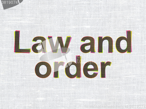 Image of Law concept: Law And Order on fabric texture background