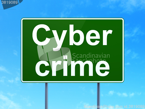 Image of Security concept: Cyber Crime on road sign background