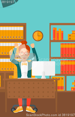 Image of Woman working at office.