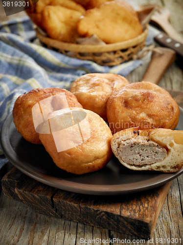 Image of fried meat pies belyashi