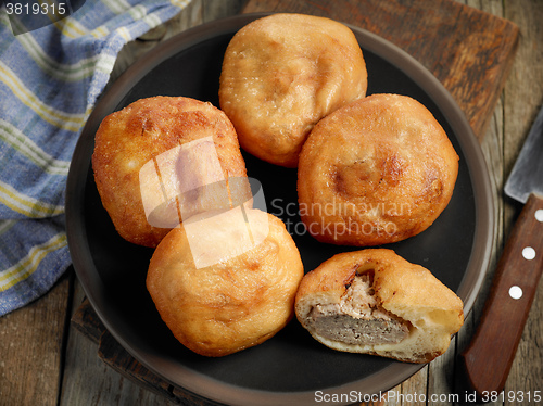 Image of fried meat pies belyashi