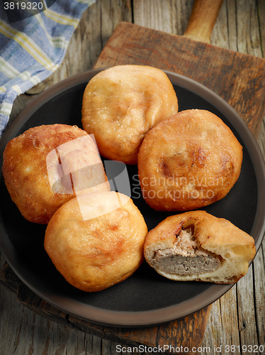 Image of fried meat pies belyashi