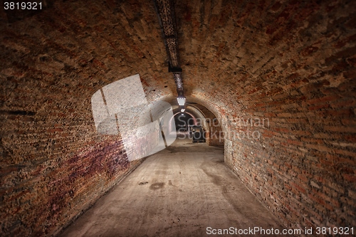 Image of Long underground brick tunnel angle shot