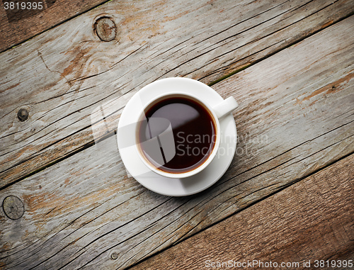 Image of cup of coffee on wooden table