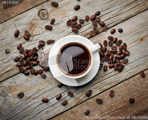 Image of cup of coffee on wooden table