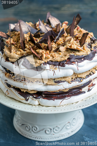 Image of Coffee cake with nuts and chocolate. View from above.