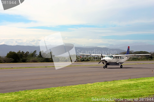 Image of Small airplane in mountains