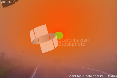 Image of travel by car on the highway at sun, sunrise