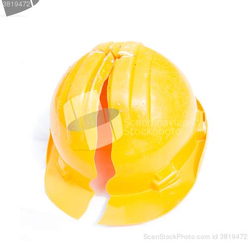 Image of broken safety helmet on white