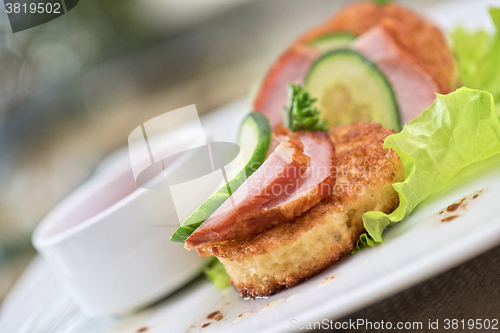 Image of pancakes with ham and cucumber 