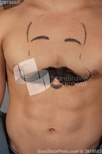 Image of male torso with moustache