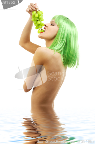 Image of green hair girl with a bunch of grapes in water