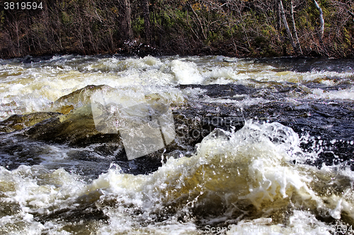 Image of rapid waters of  river strong