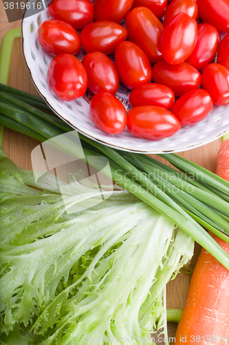 Image of vegetables on a wooden background