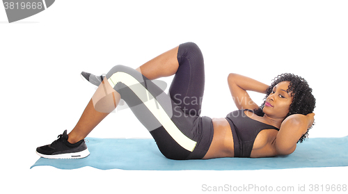 Image of African American woman doing exercises.