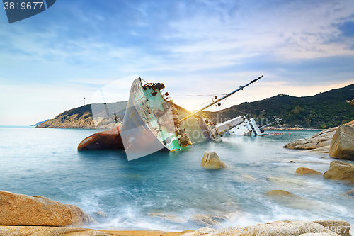 Image of shipwreck or wrecked cargo ship abandoned