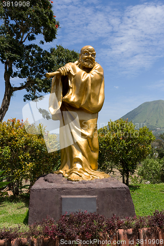 Image of fat monk statue in complex Pagoda Ekayana