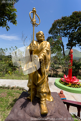 Image of fat monk statue in complex Pagoda Ekayana