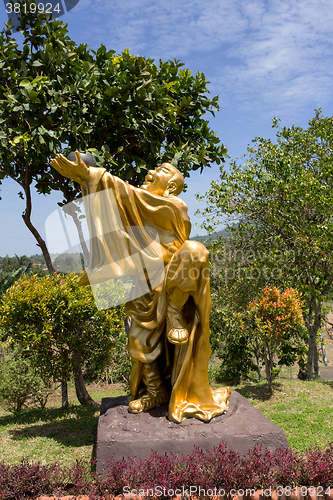 Image of fat monk statue in complex Pagoda Ekayana