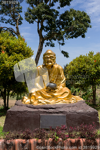 Image of fat monk statue in complex Pagoda Ekayana