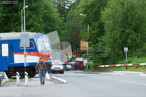 Image of Train riding over a railway crossing in Svetlogorsk. Russia