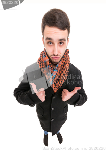 Image of Young Man in Black Dress Show Thumbs Up