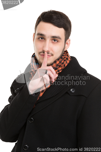 Image of Young Man is Asking for Silence
