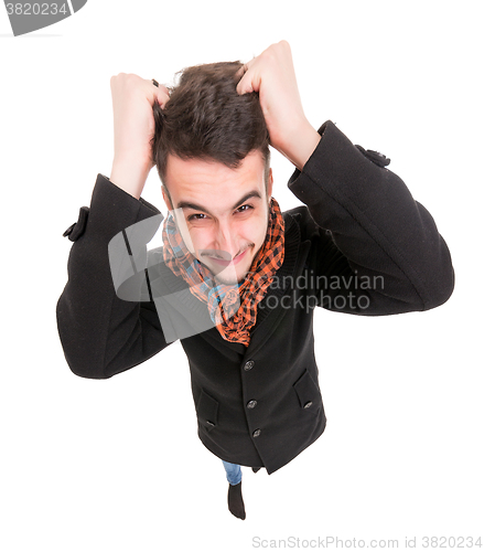 Image of Young Man in Black Dress Show Frustration