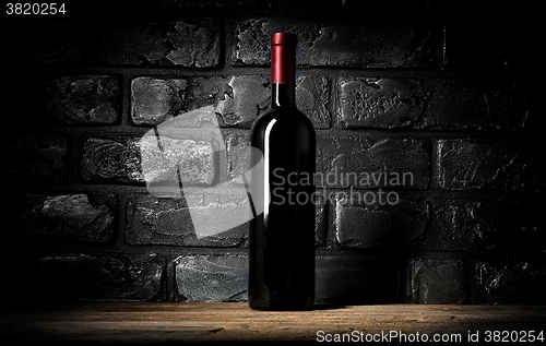 Image of Wine and wall of bricks