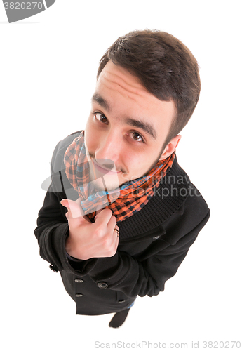 Image of Young Man in Black Dress Show Thumb Up