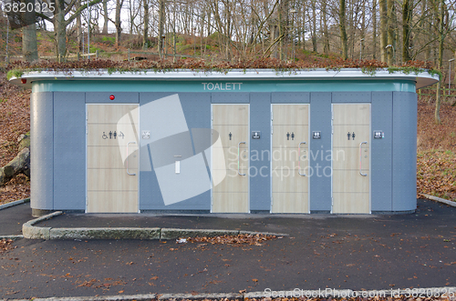 Image of one outdoor toilette for male and female 