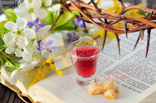 Image of Communion cup with wine and bread