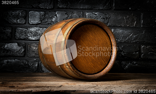 Image of Brick wall and barrel