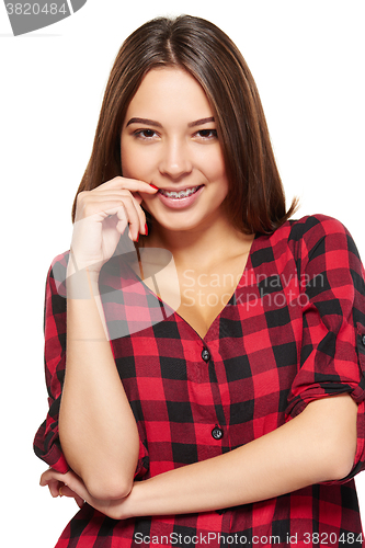 Image of Female smiling with braces on her teeth