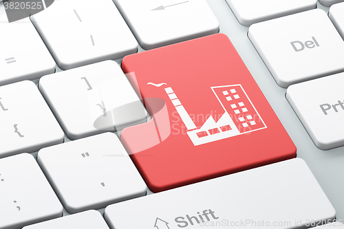 Image of Finance concept: Industry Building on computer keyboard background