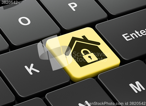 Image of Finance concept: Home on computer keyboard background