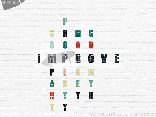 Image of Finance concept: Improve in Crossword Puzzle