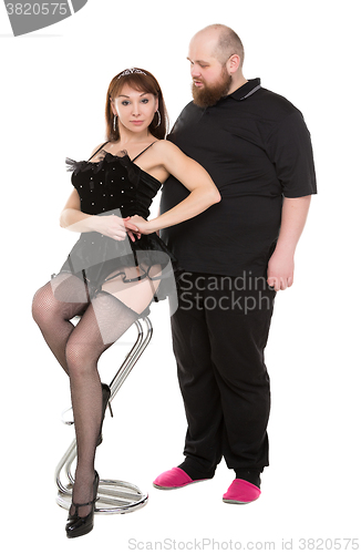 Image of Cheerful Couple Fat man and Beautiful Woman in Lingerie