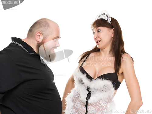 Image of Fat Man Lustfully Watching on Breast Attractive Woman in Lingeri