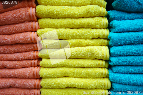 Image of Stacks of multicolored towels