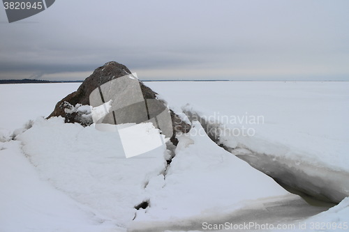 Image of  seascape rock under the ice