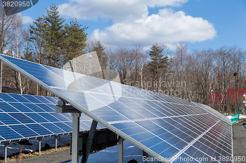 Image of Solar panel plant in countryside