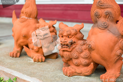 Image of Japanese red lion statue