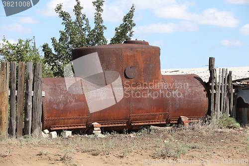 Image of rusty oil storage tank