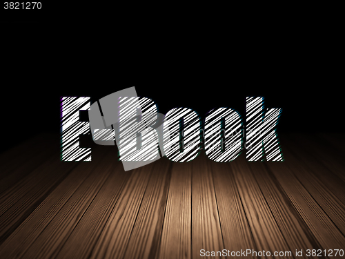Image of Studying concept: E-Book in grunge dark room